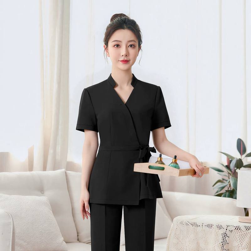 Licensed massage therapist in professional uniform